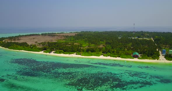 Natural drone island view of a summer white paradise sand beach and aqua turquoise water background 