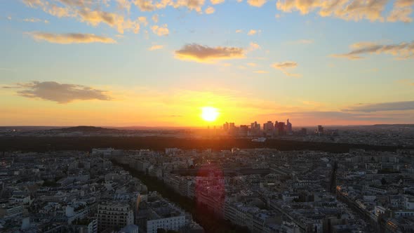 The sun sets on the city of Paris