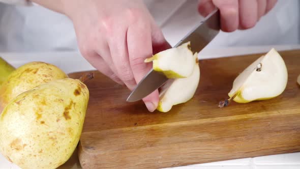 Close-up video of cutting kiwi