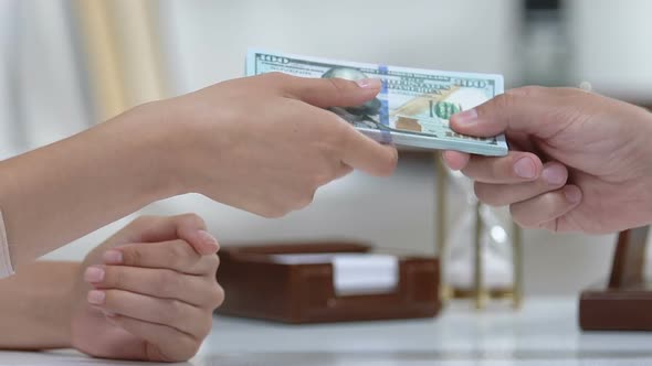 Man Giving Woman Dollar Cash, Payment for Service, Business Deal, Contract
