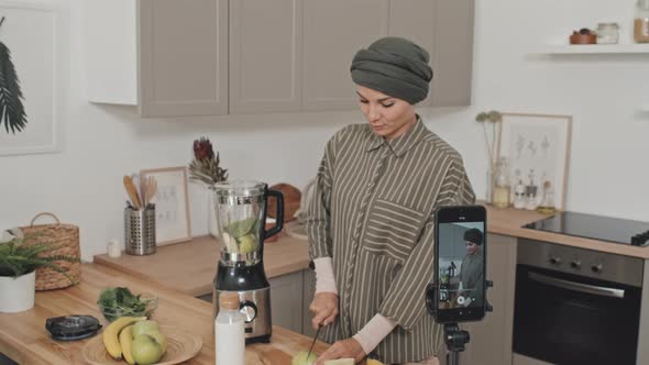 Muslim Food Blogger Filming Video Recipe in Kitchen