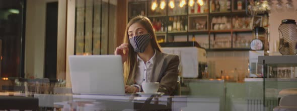 Attractive woman working on laptop