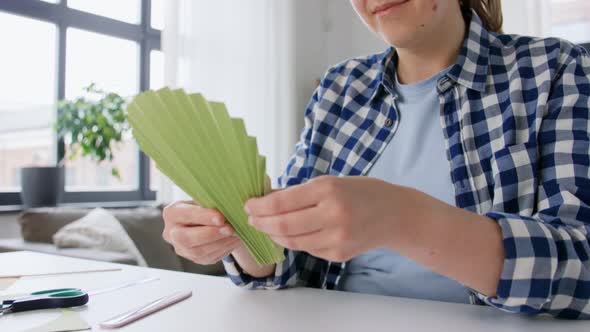 Woman Making Paper Craft at Home