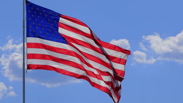 The flag of the United States of American blowing in the wind