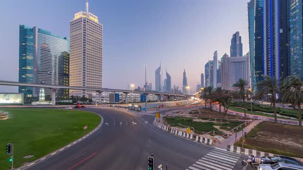 Traffic on Intersection and Bridge at the Sheikh Zayed Road Day to Night Timelapse