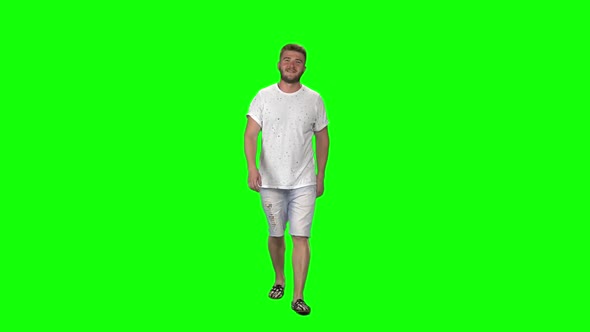 Bearded Guy Calmly Walking on Green Screen Background