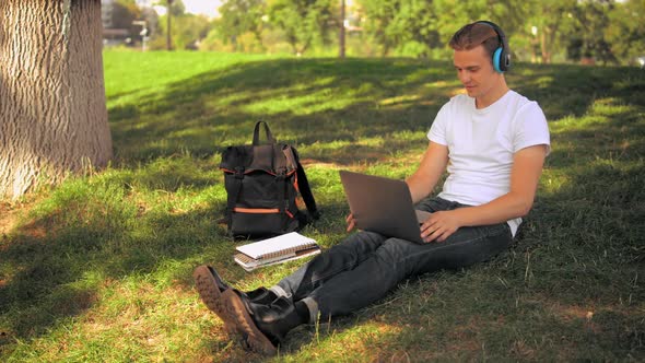 Young Man Listen Song Outdoors