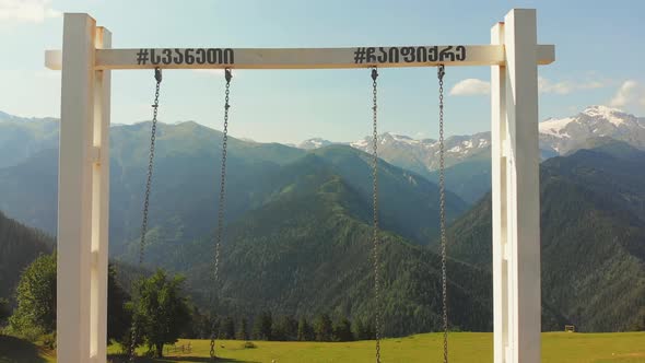 Revealing Back View Of Person On Iconic Swings Svaneti 