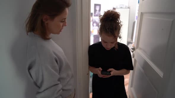 Mother Knocks on the Door of the Daughters Room