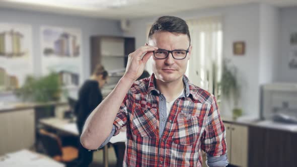 Young Designer Posing at Camera