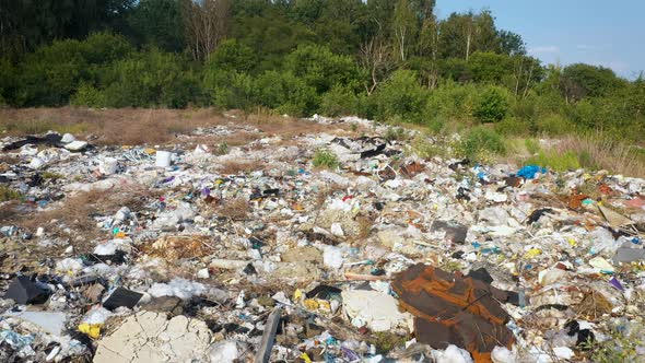 Aerial Flying Over Piles Of Plastic Garbage And Household Waste In A Landfill