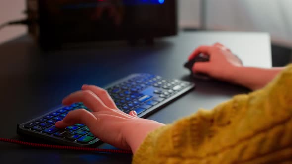 Closeup on Woman Hands Gamer Playing Video Game