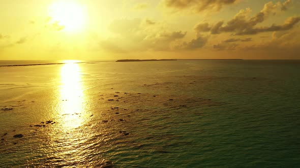 Natural birds eye island view of a white paradise beach and blue sea background in high resolution 4