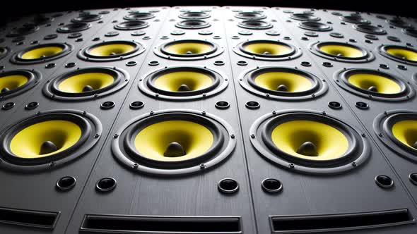 Yellow, modern speakers stacked in an endless wall loop. Membranes vibrate. 4KHD