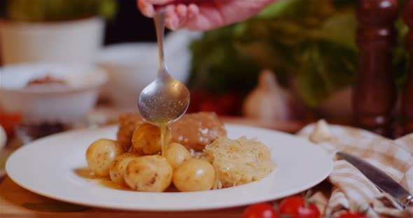 Meal In Plate Amidst Various Ingredients Assorted On Wooden Table