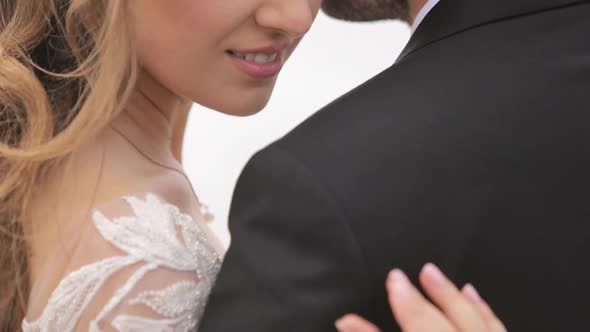 Bride and Groom Kissing Happy Brides