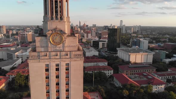 Very dynamic shot of the UT tower. 3 axis motion as the drone does a flyby to reveal downtown Austin