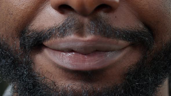 Macro Shot of Man Moving His Lips in Front of Camera