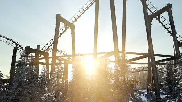 Old Roller Coaster at Sunset in Forest