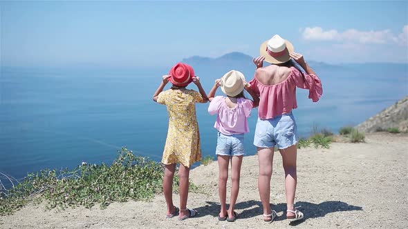 Happy Beautiful Family on a Tropical Beach Vacation