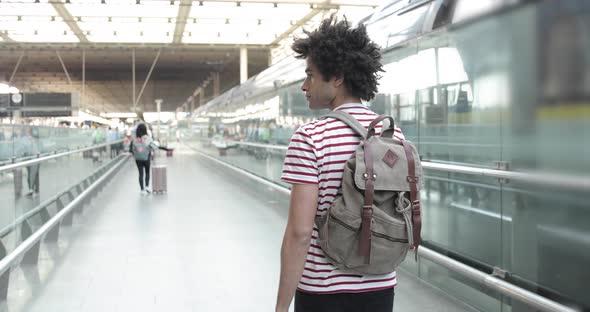 Man walking to the train at station