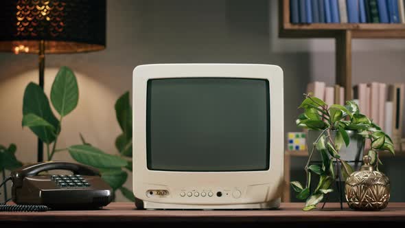 Old Television with Grey Screen on Home Background