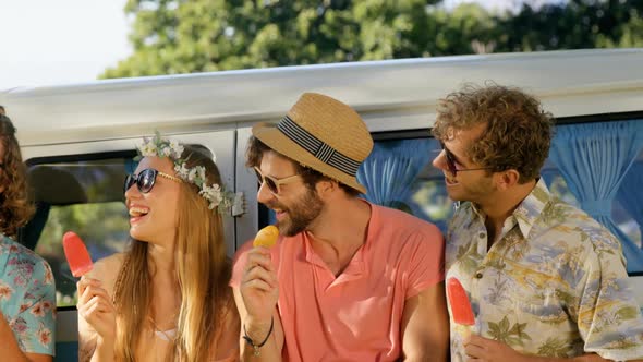 Group of hipster friends eating ice cream