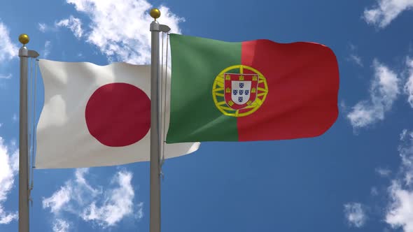Japan Flag Vs Portugal Flag On Flagpole