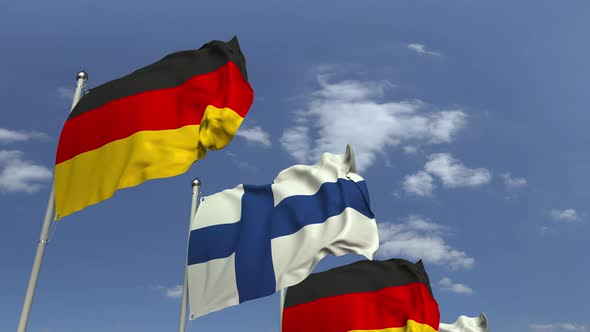 Row of Waving Flags of Finland and Germany