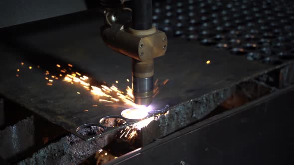 Plasma cutting of metal on an automatic laser machine. Laser cutter in the production.