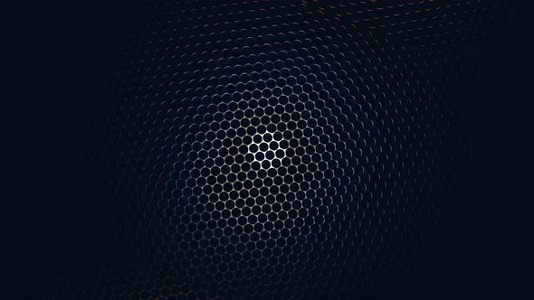 A metal mesh with colorful round holes like a rotating background