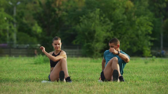 Couple doing stretching exercise