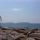 Young woman walking on rocks near the sea - VideoHive Item for Sale