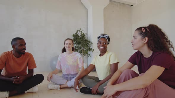 Young People Chatting in Dance Studio