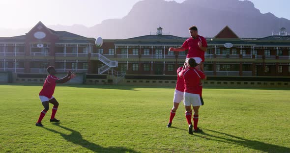 Male rugby players playing rugby in the stadium 4k