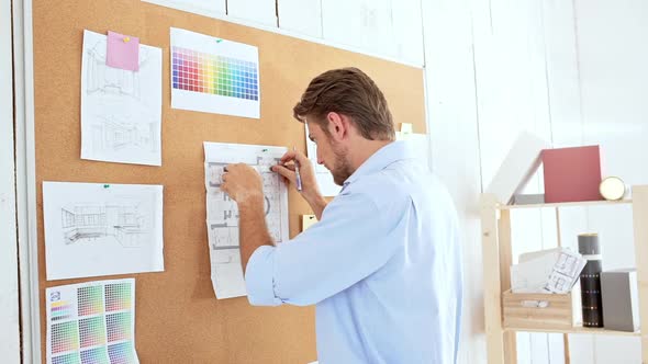 Successful Architector Standing Near Board Checking Drawings in Office Slow Motion