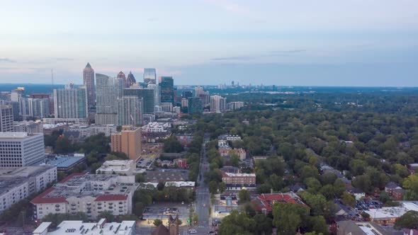 Drone time lapse flying north in Midtown Atlanta at dusk