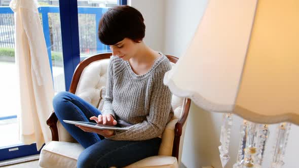 Woman using digital tablet