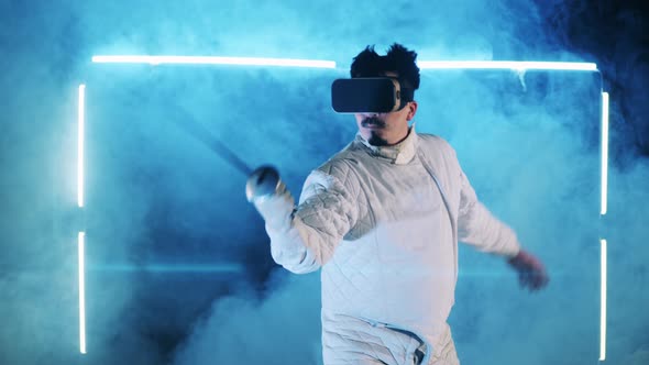 Male Fencer is Using a VRdevice While Training