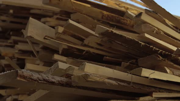 A Huge Warehouse of Wood Under the Open Sky