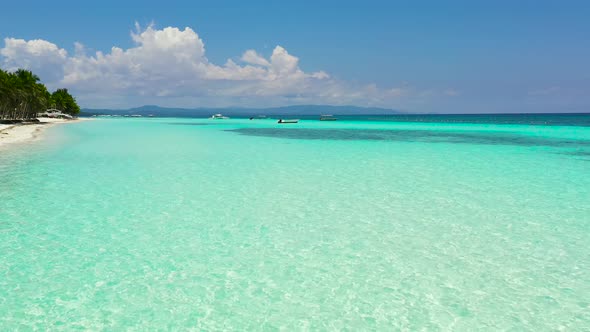 Sandy Beach and Tropical Sea