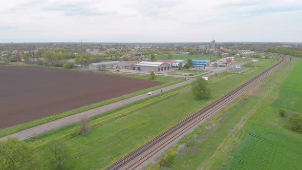 Railway And Car On Bad Road