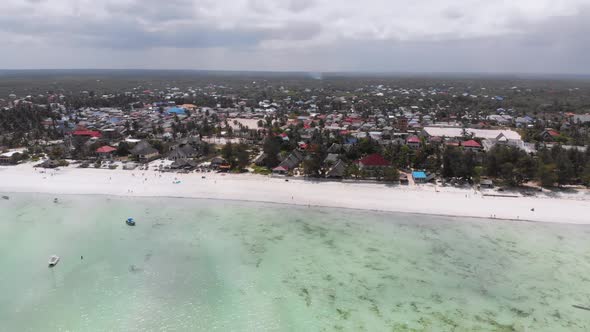 Ocean Coastline with Paradise Beach Hotels and Palm Trees Zanzibar Aerial View