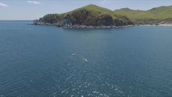 Aerial Drone Video of Sup Between 2 Men in Tropical Caribbean Waters