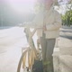 Female with Bicycle Enjoying Sunlight - VideoHive Item for Sale