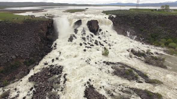 Aerial view of huge overflow waterfall at Magic Reservoir