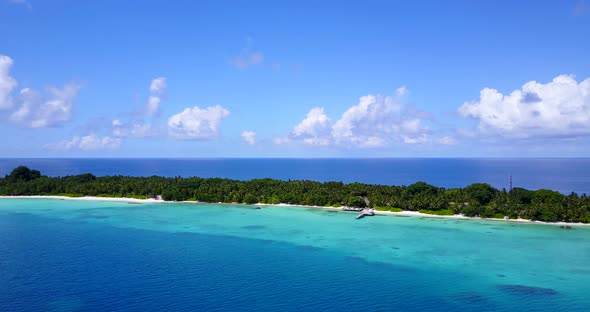 Wide angle fly over abstract view of a summer white paradise sand beach and aqua turquoise water bac