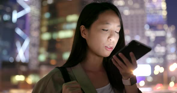 Woman Use of Cellphone for Online at Night
