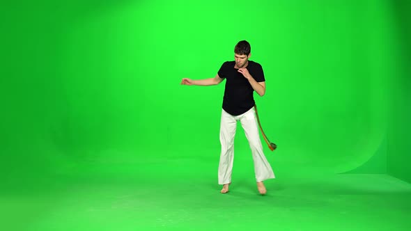 Man Practicing Capoeira on Chroma Key.