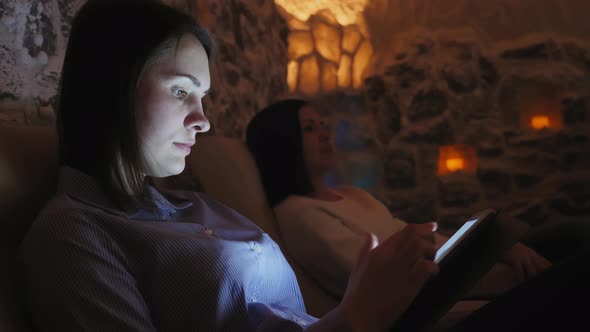 Two Women Relaxing in a Salt Cave at Halotherapy